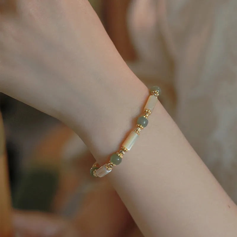 Natural Hetian jade white lip shell bracelet with single round bead minimalist design