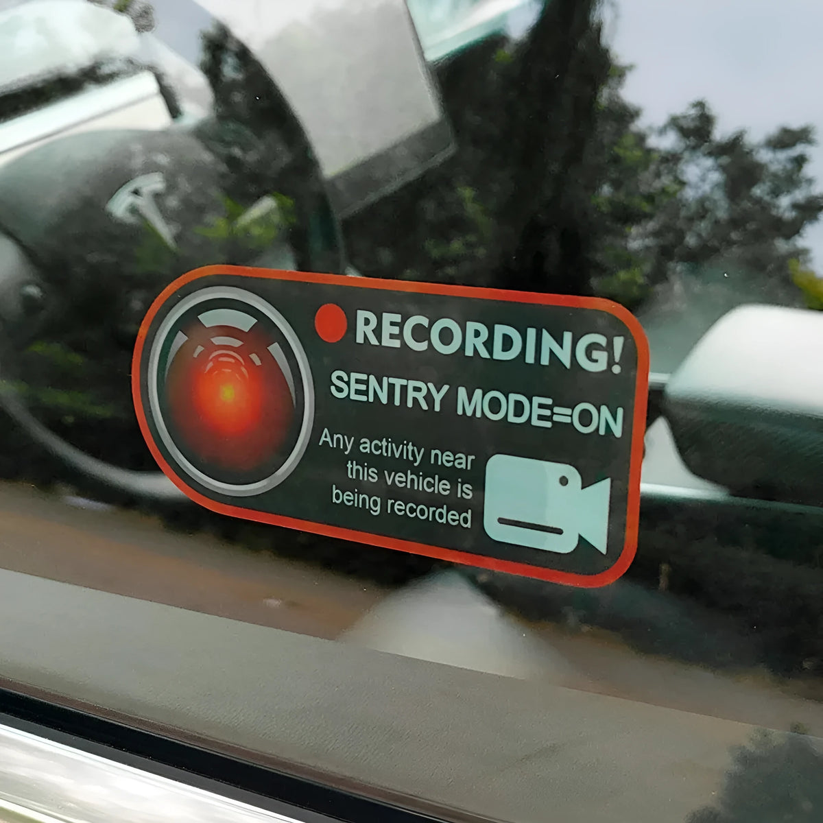 Tesla Sentry Mode warning stickers measuring 11x5 cm with electrostatic adhesive backing