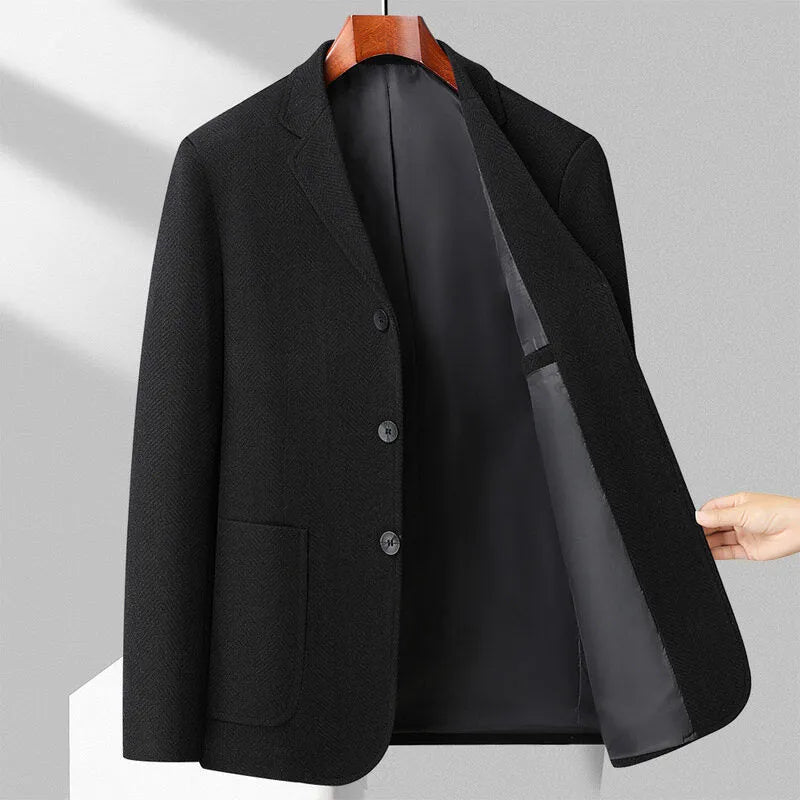 Men's loose-fit solid-colour casual coat in black, shown on a hanger.