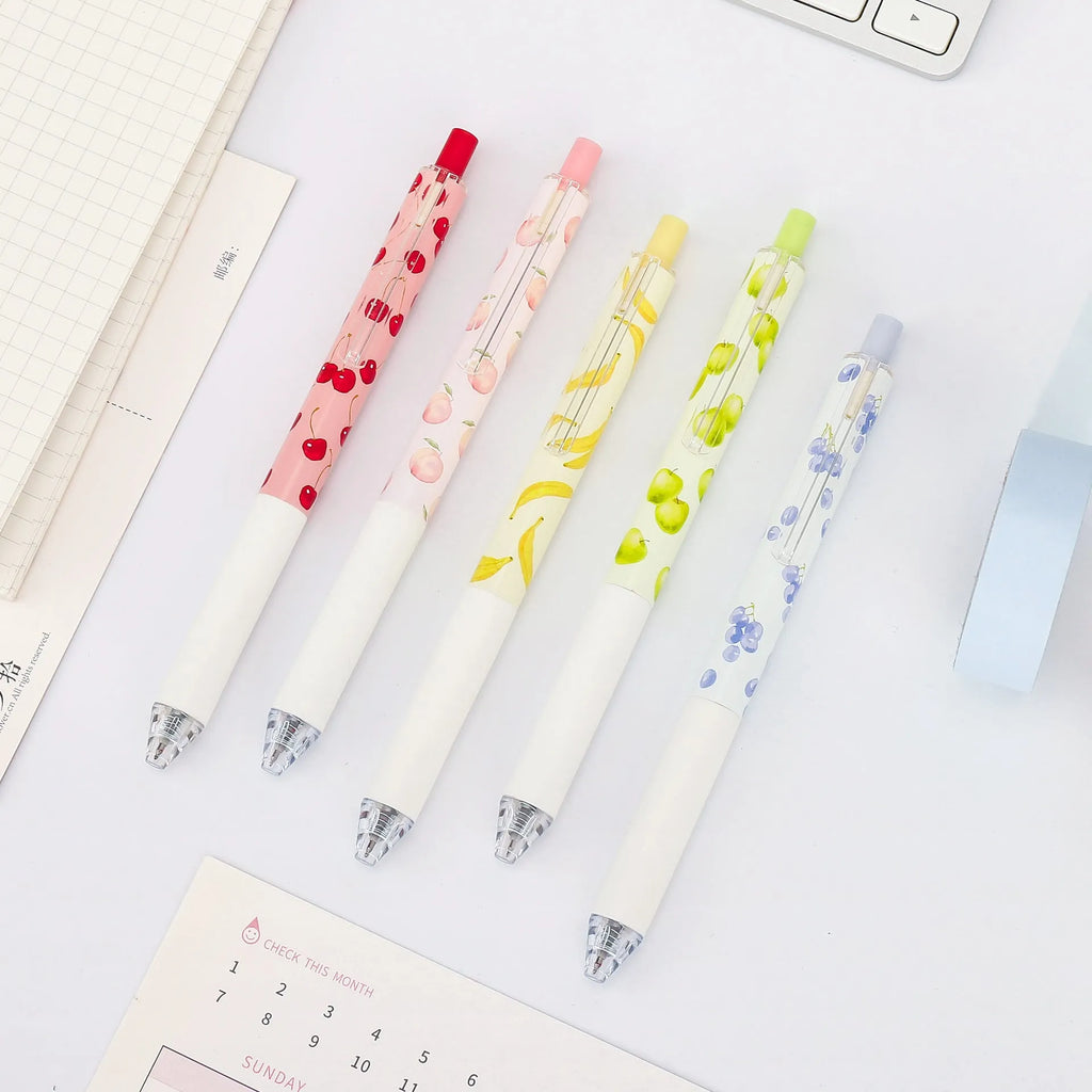 Three fruit-scented pressurised pens with push-button mechanisms and 0.5mm black refills