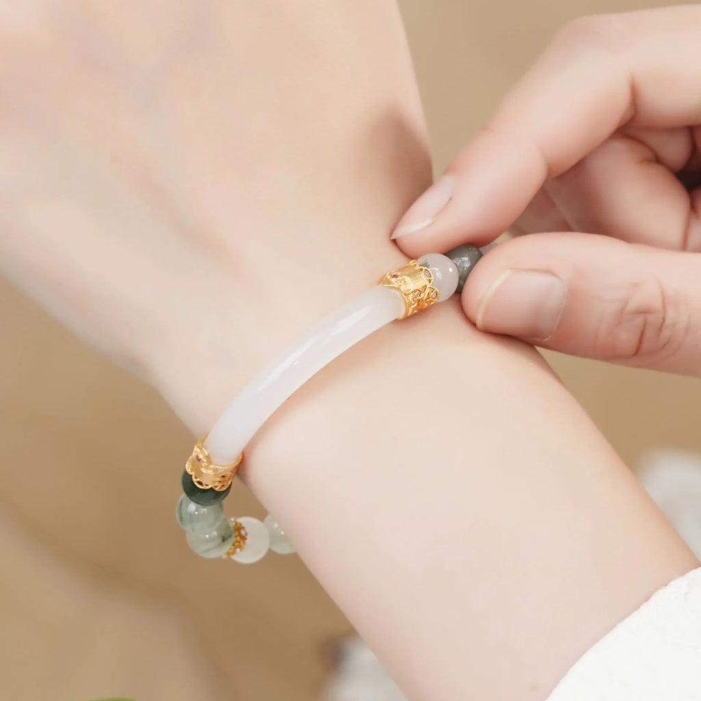 Light green emerald jadeite half bracelet with ice-like texture and round beads