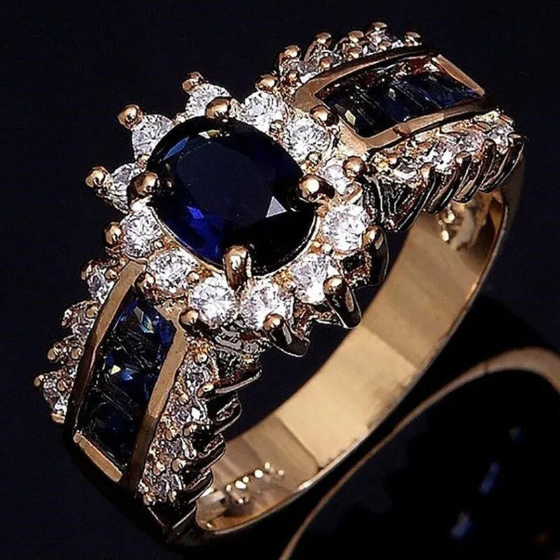 Personalised zinc alloy fashion ring with diamond or blue and purple zircon stone detailing.