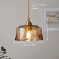 Nordic retro style brass and glass B-shaped chandelier pendant light for ceiling installation.