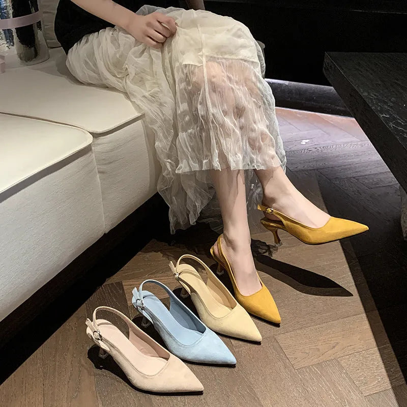 Women's apricot suede pointed-toe stiletto high heels on a light background.
