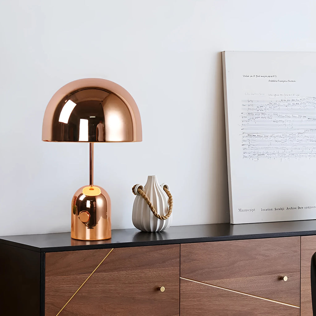 Post-modern metal table lamp with 280mm diameter in rose gold finish on wooden surface