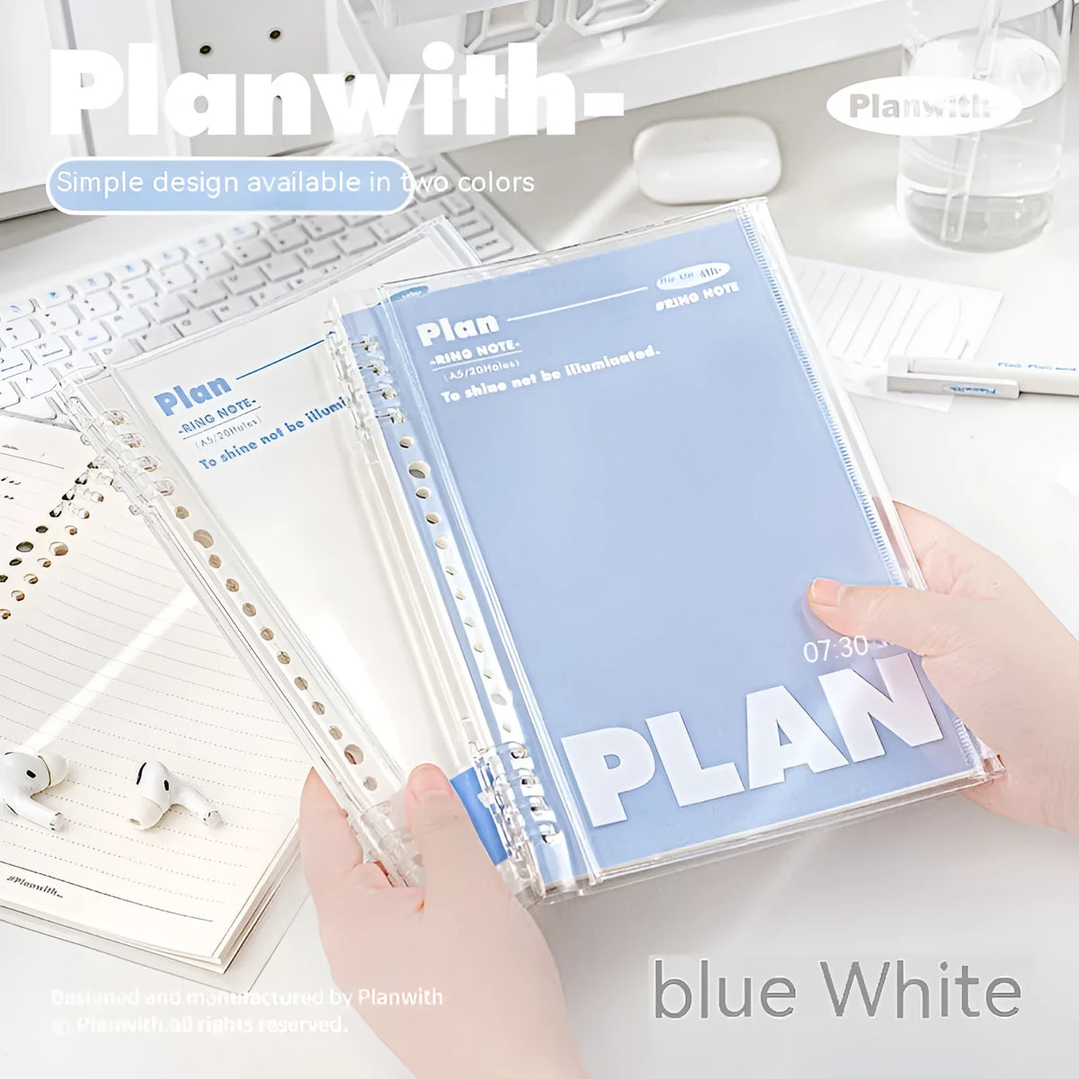 A5 PVC spiral notebook with transparent cover in blue or white, showing spiral binding and standard paper size