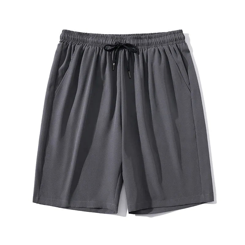 Men's black quick-dry cropped sports trousers with elastic waist and straight leg fit