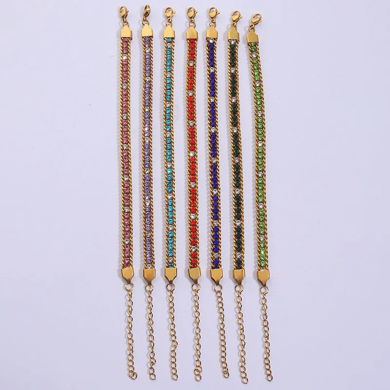 Three-layer gold electroplated stainless steel chain bracelet on women's wrist with geometric links
