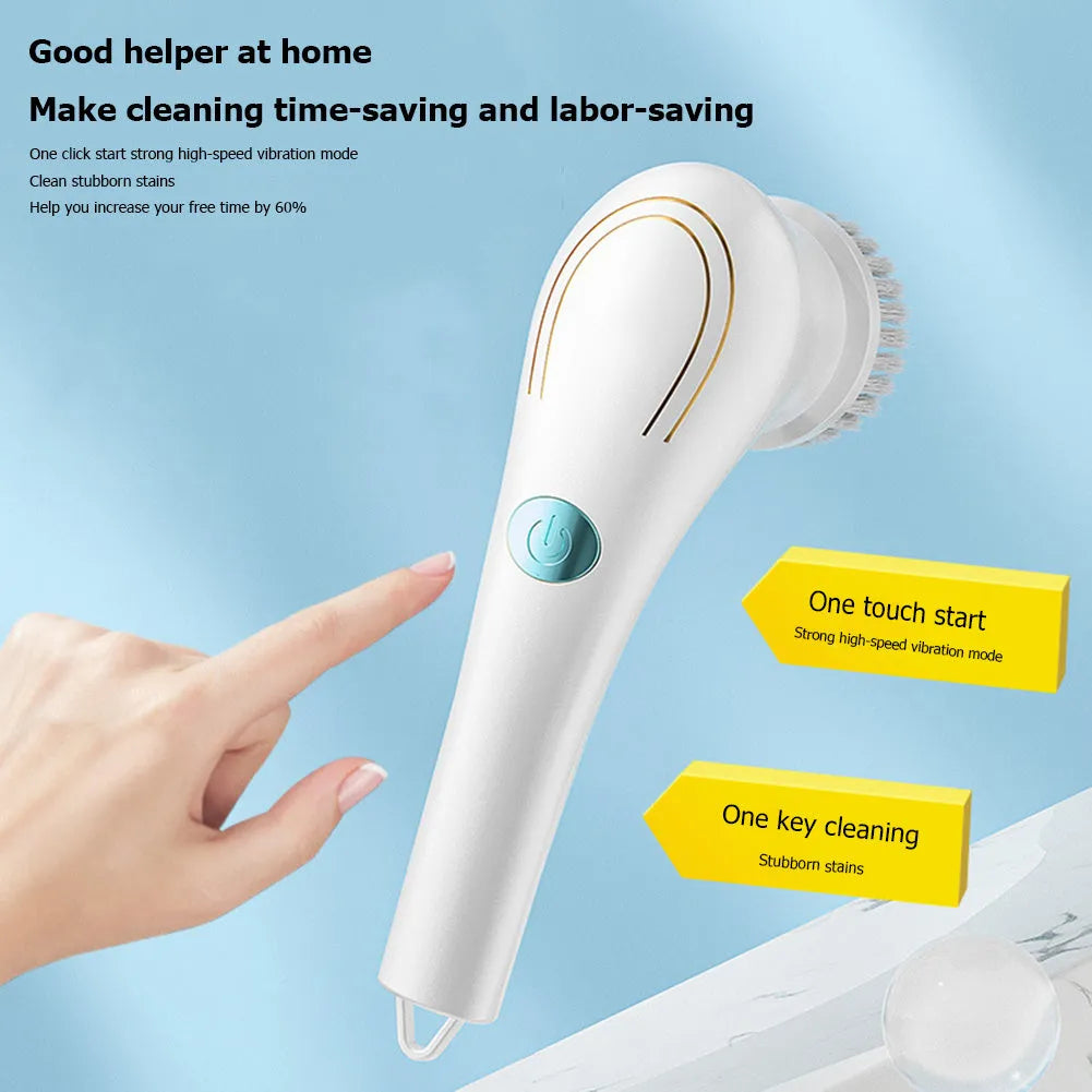 White cordless electric scrubber with five interchangeable brush heads on a kitchen counter