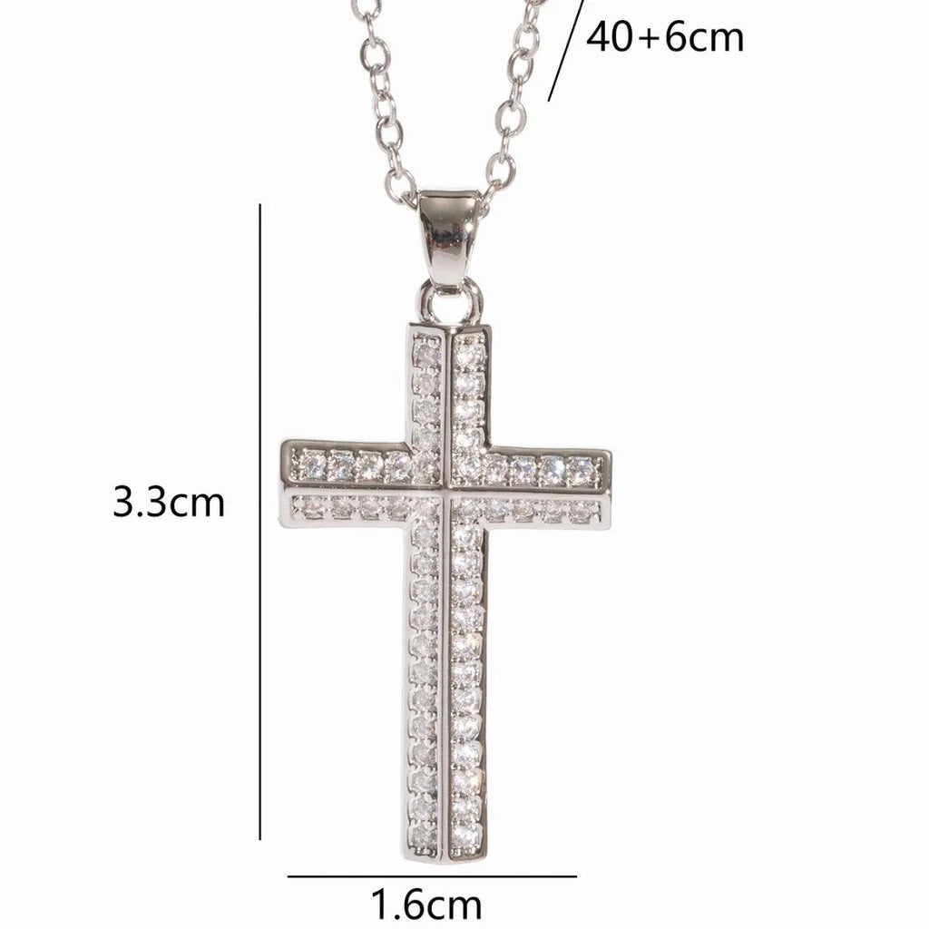 Gold electroplated copper cross necklace with micro inlaid zircon on a 41-50cm O-ring chain.