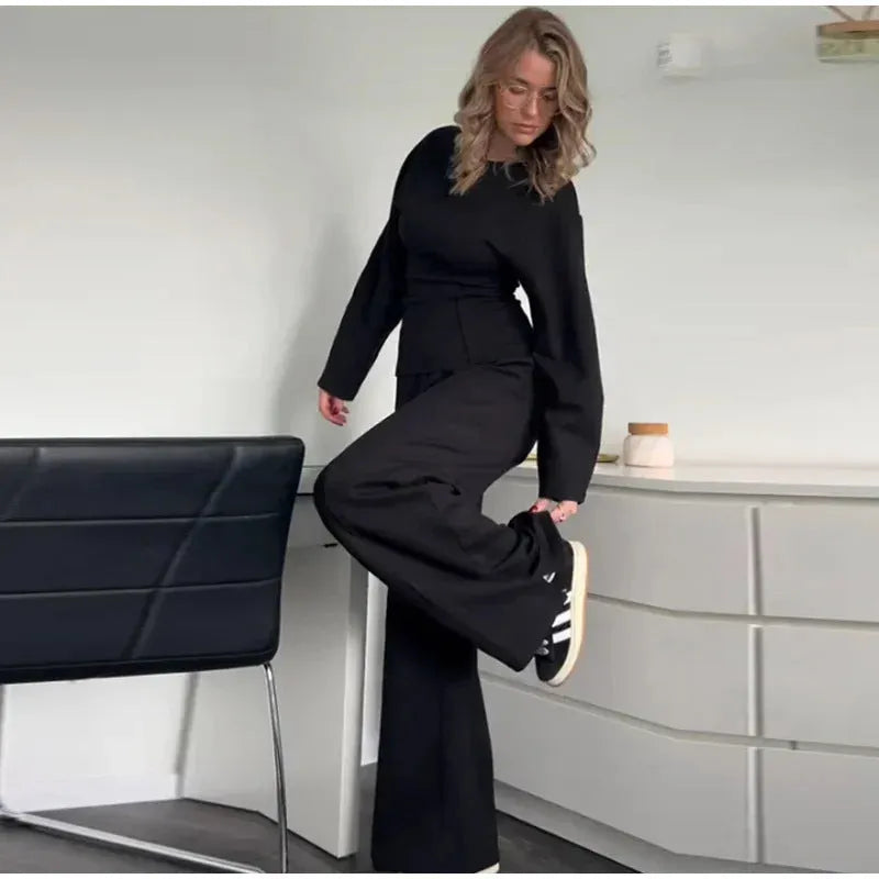 Women's polar fleece suit set with long sleeve O-neck top and wide leg trousers in multiple colour options.