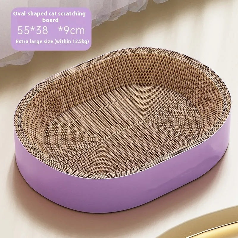 Green oval corrugated paper cat scratch board and nest bed, 55cm diameter.