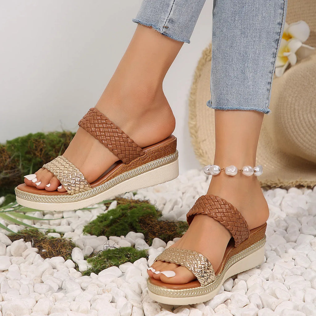 Gold women's wedge sandal with PU upper and rubber sole, shown from the side.