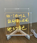 Acrylic DIY note board LED night light with USB cable, bracket, and colourful pens on a desk