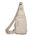Women's soft brown PU leather crossbody chest bag with open pocket and adjustable strap.