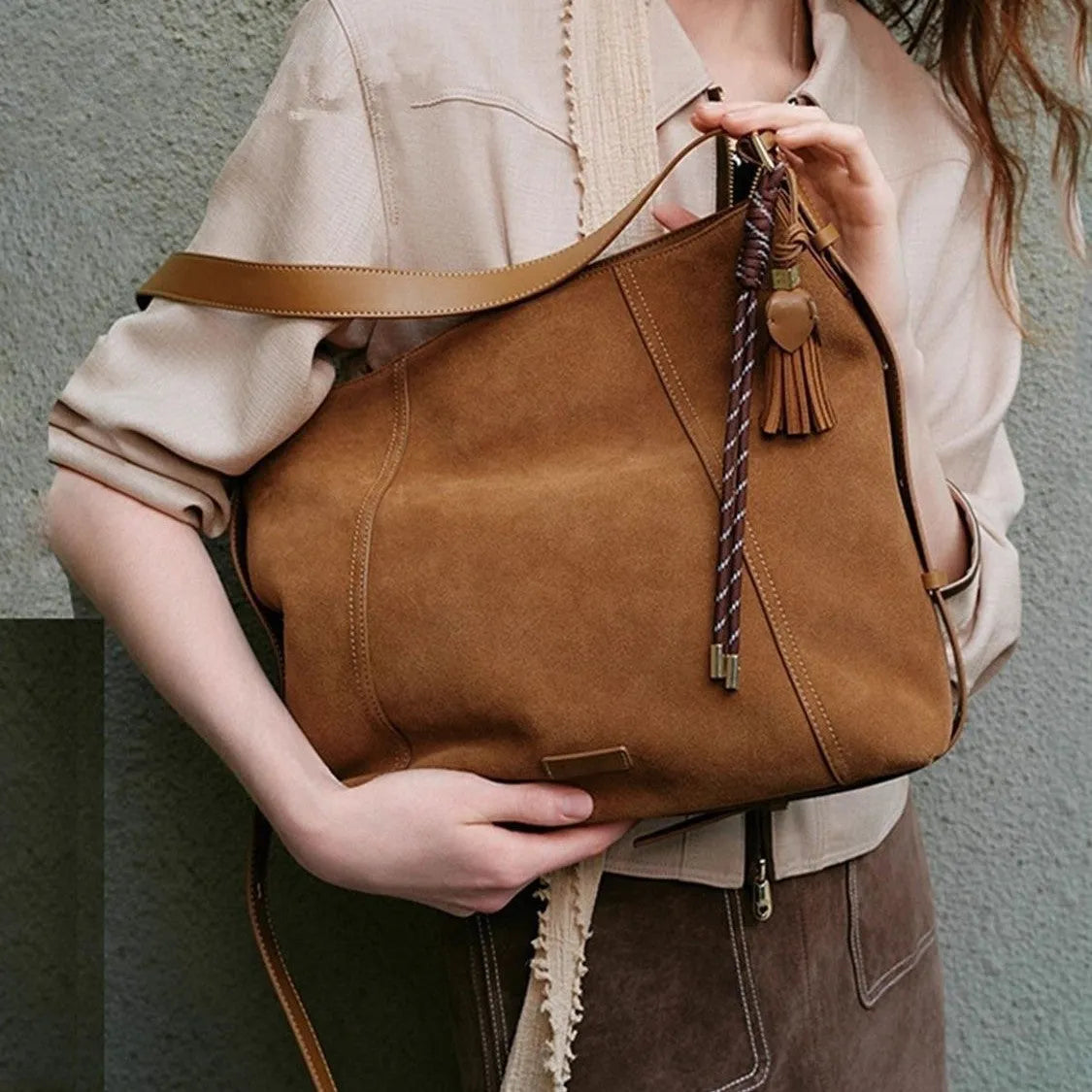 Large capacity deerskin velvet tote bag in Maillard coffee with sewing line details and crossbody strap