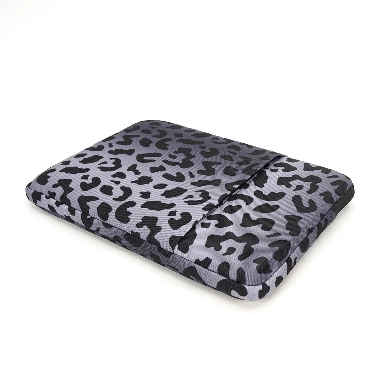 Leopard print flannel lined laptop sleeve for 13-inch to 16-inch devices with waterproof polyester exterior.