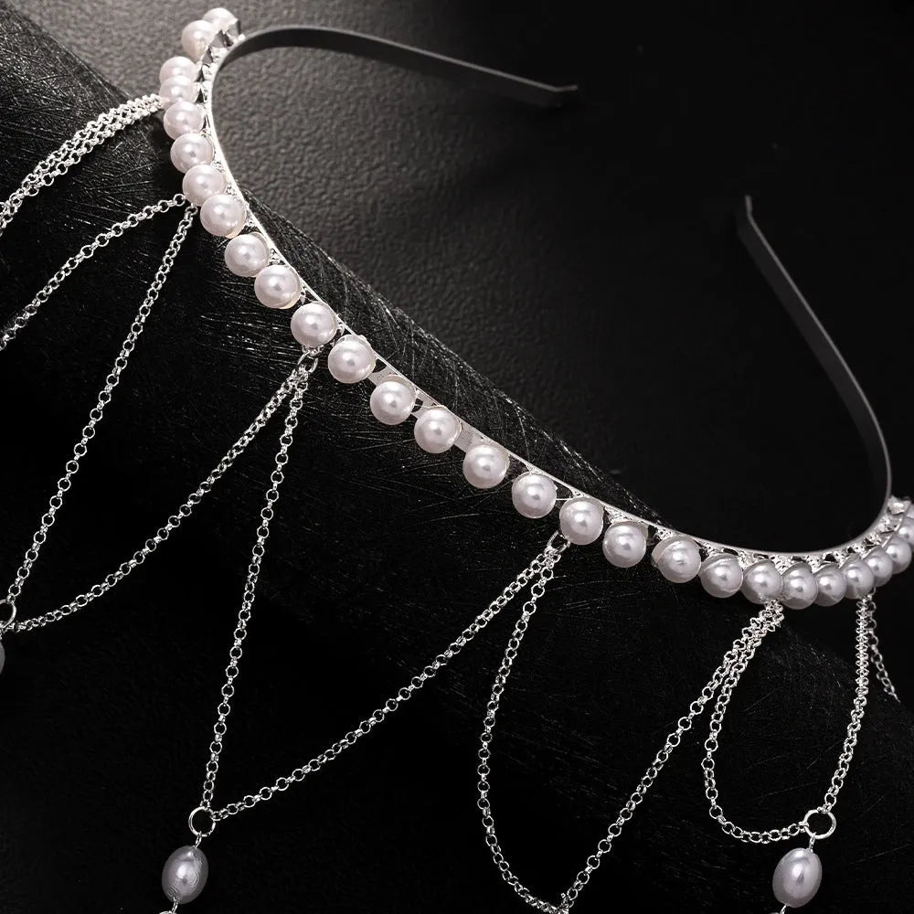 Gold or silver metal hair chain with tassel details and pearl accents for women's hairstyles