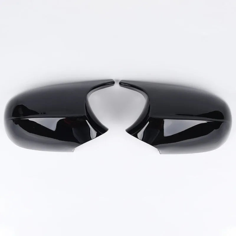 Pair of black ABS plastic rearview mirror shells for BMW 3 Series E90 door mirrors.