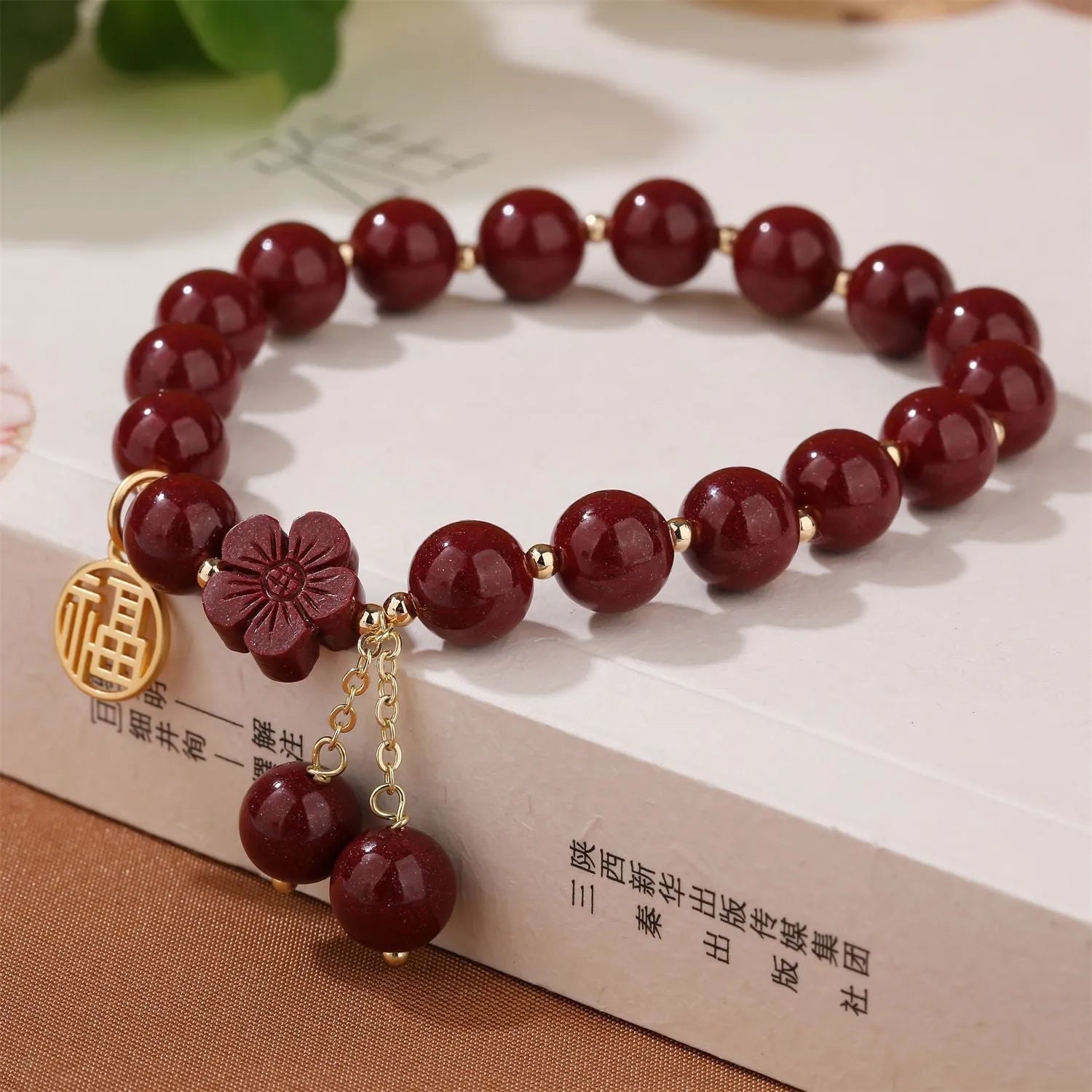 Retro women's cinnabar bracelet with Fu character charm in purple gold sand colour