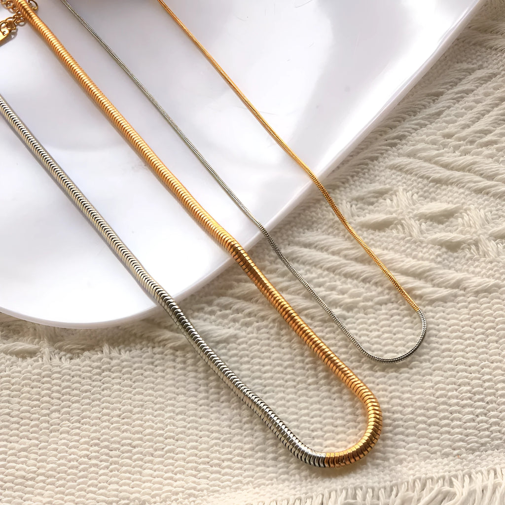 Golden 3mm snake bones chain necklace with geometric design for women