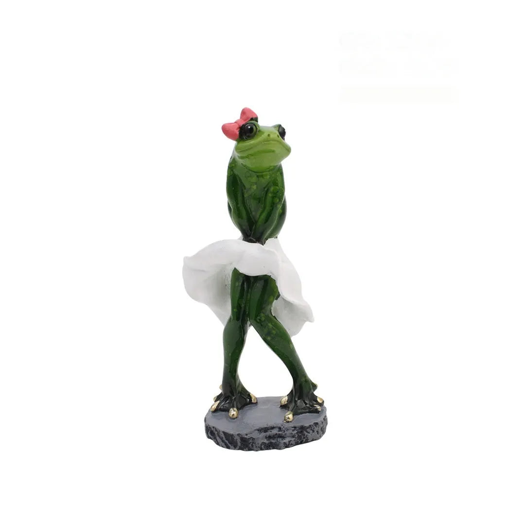 Synthetic resin pastoral style frog figurine home decoration ornament on a surface.