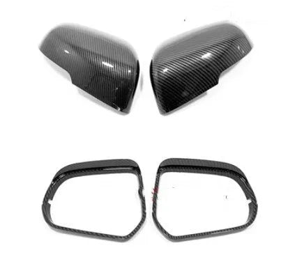 Plastic rearview mirror protection cover in carbon fibre black finish