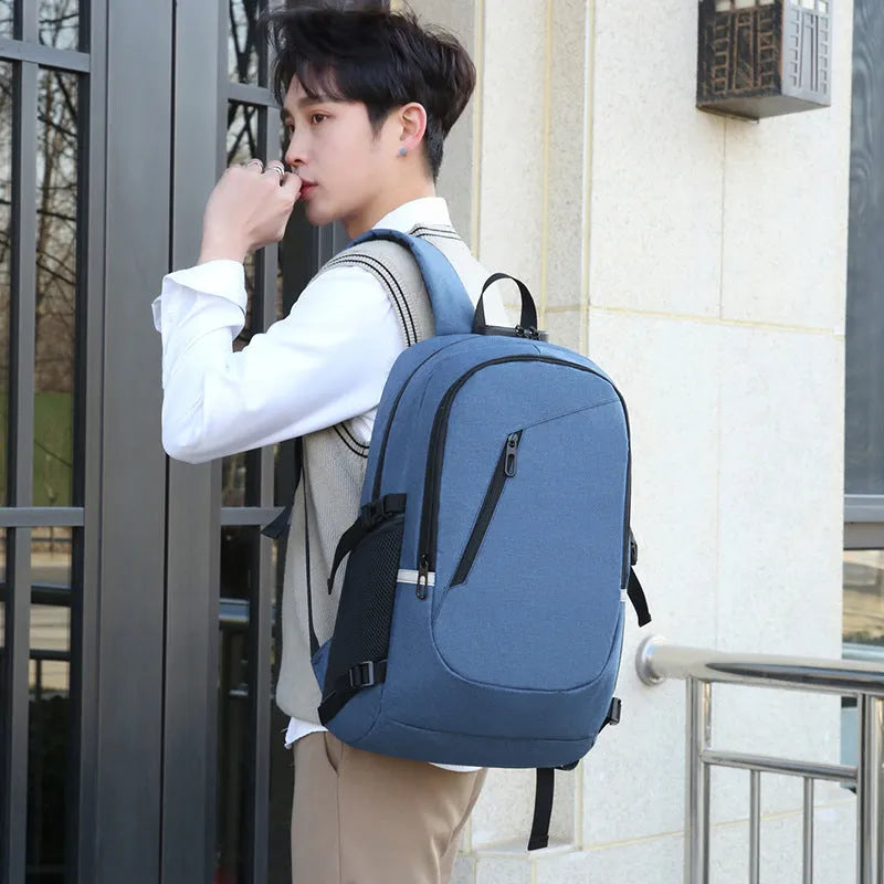 Men's solid colour oxford cloth computer backpack with street style, shown in blue