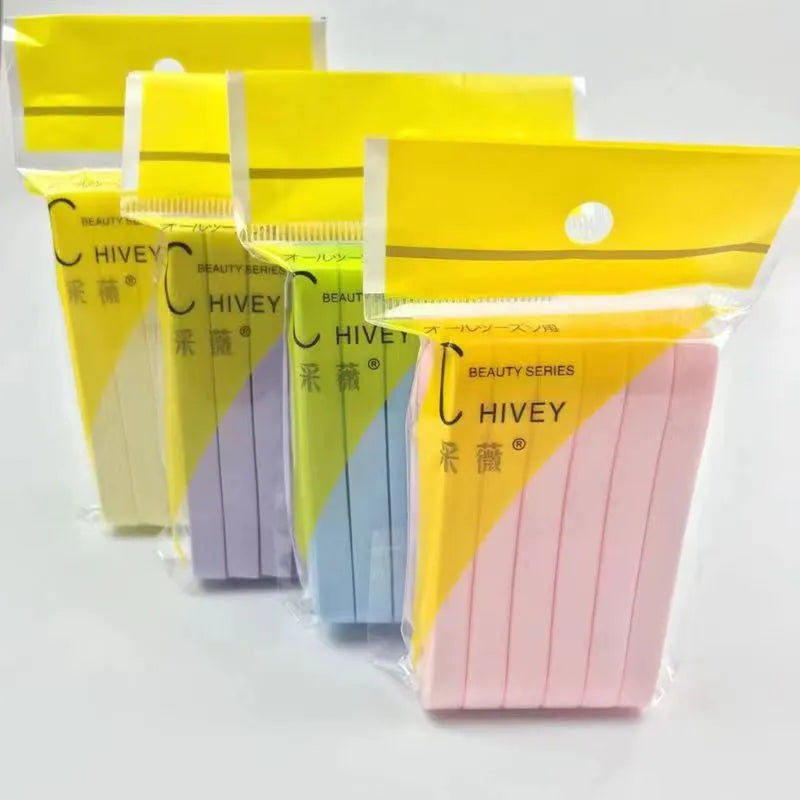 Compressed facial wipe puff in pink packaging, individually wrapped PVA sponge for single use cleansing