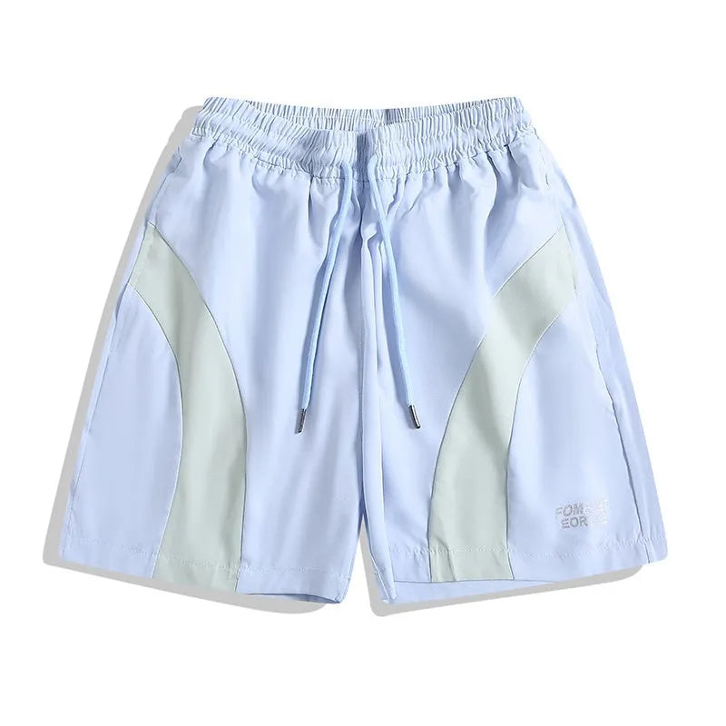 Loose fit quick-drying sports shorts in black, featuring an elastic waistband and straight-leg design.