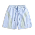 Loose fit quick-drying sports shorts in black, featuring an elastic waistband and straight-leg design.