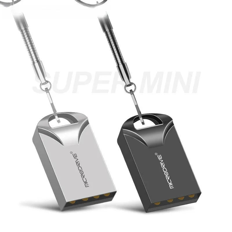 Small black and silver metal USB flash drive showing compact size next to a ruler for scale