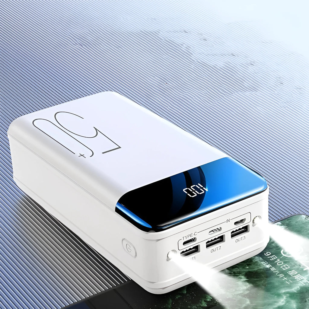Large 50000mAh capacity power bank with three output ports in black plastic casing