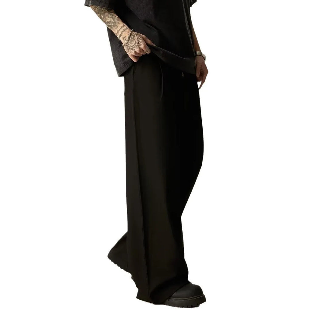 Men's black vertical tube wide-leg casual trousers showing straight-leg silhouette and mid waist design