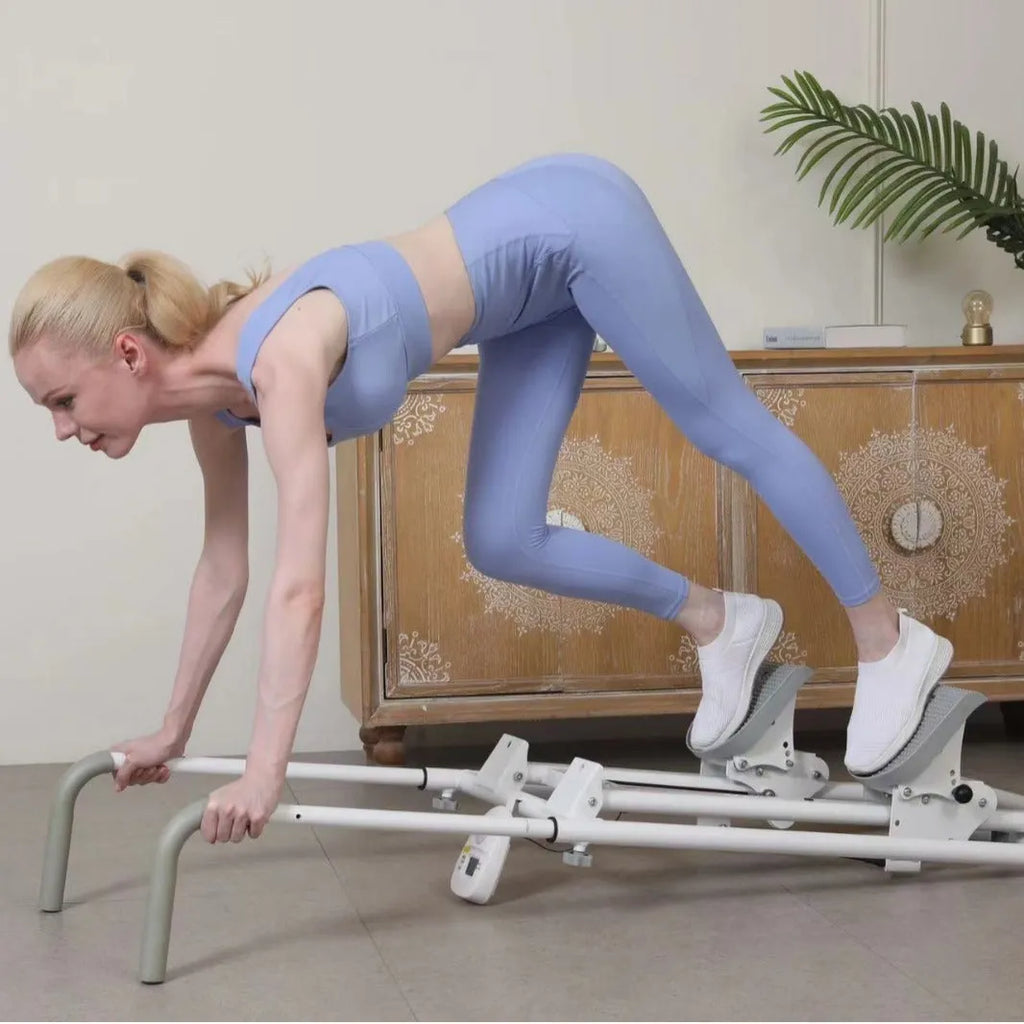 White folding treadmill with integrated climbing bars for home fitness
