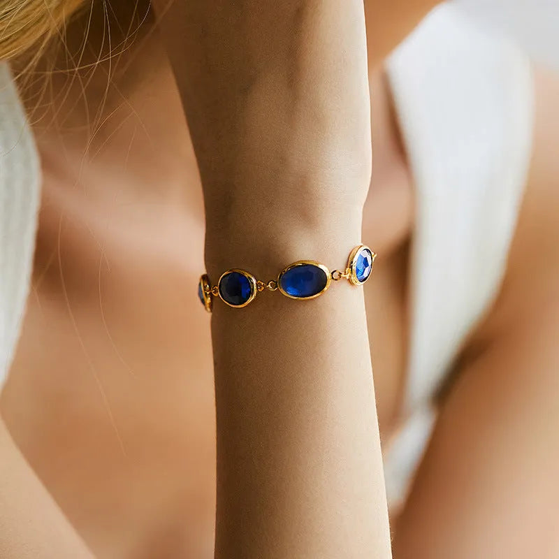 Women's geometric ellipse bracelet with glass inlay embroidery on 18K copper in blue colour option