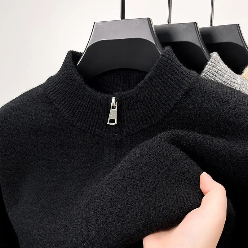 Men's black stand collar zipper cardigan in a loose, thickened knit on a hanger.