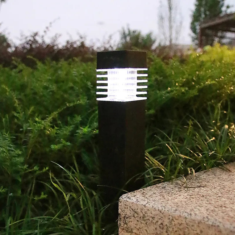 Solar-powered lawn ground lamp with cuboid design measuring 60 x 390 mm