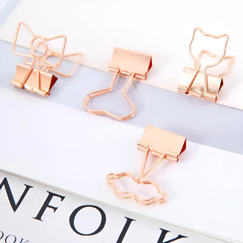 Gold metal office clip with long tail and decorative charm options including flamingo, love, clouds, cat, cactus and bow designs
