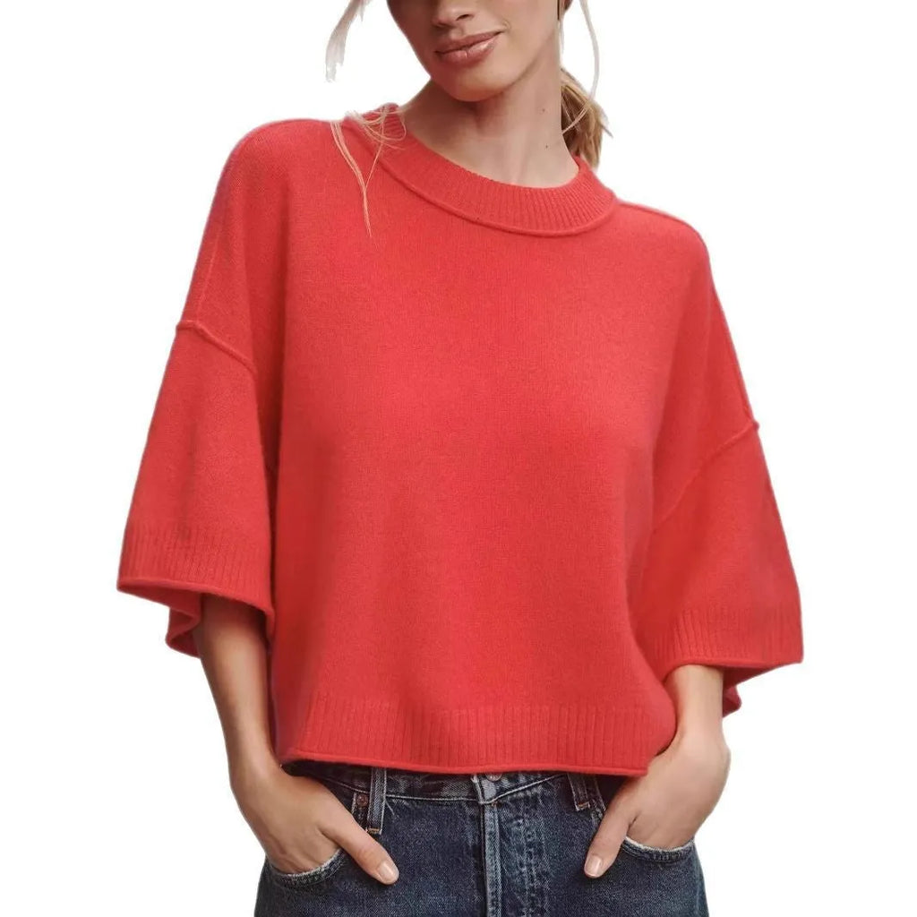 Red short viscose T-shirt with an exposed navel detail on a model, showing the regular sleeve and pullover style.