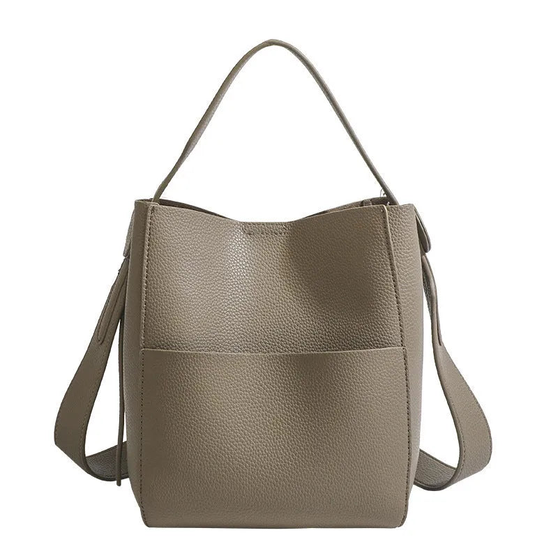 Soft PU bucket messenger bag in elephant gray with sewing line detailing and single shoulder strap