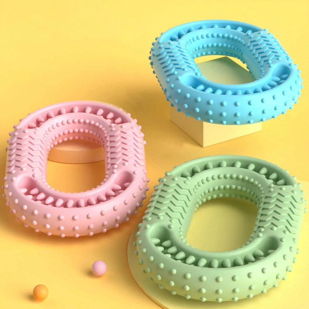 Blue O-ring shaped dog chew toy for aggressive chewers and dental care.