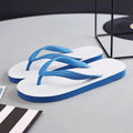 Green rubber flip-flops with a fish logo on a non-slip sole, showing deodorant feature.