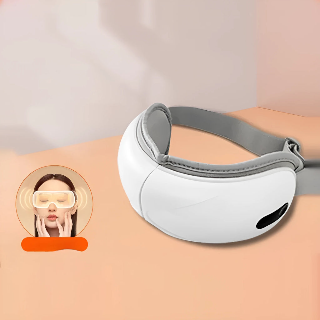 White rechargeable eye massager with airbag pressure and hot compress functions for eye fatigue relief