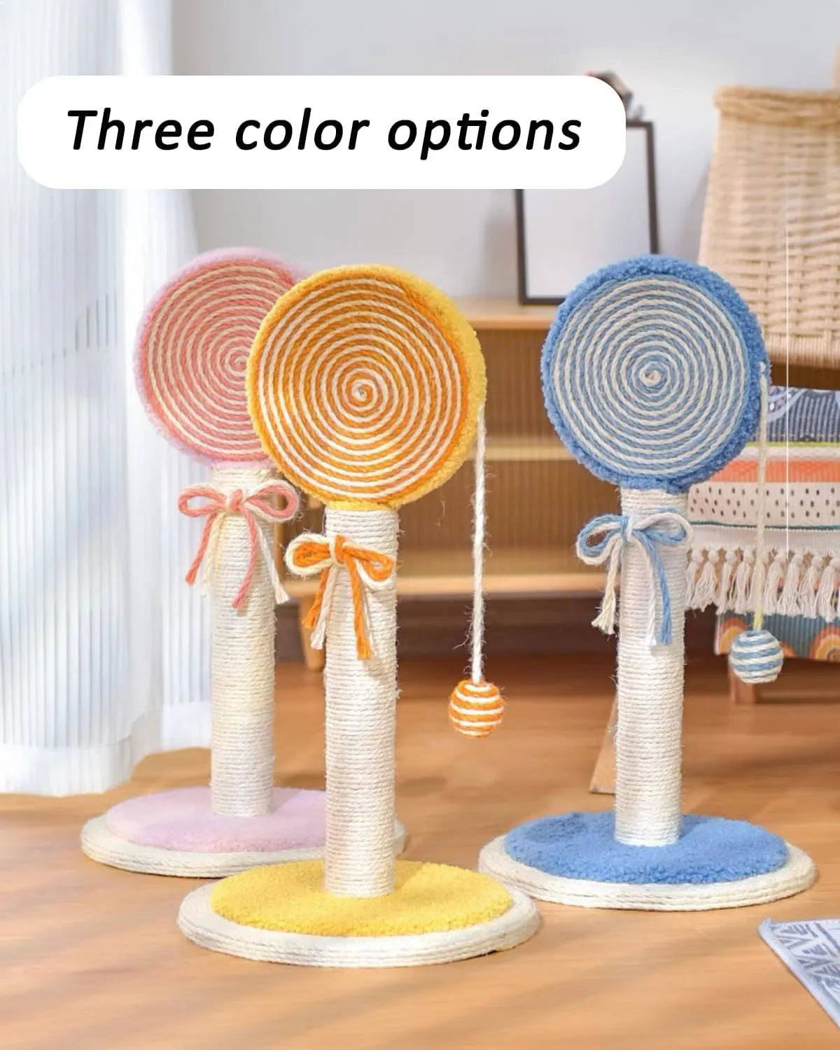 Blue cat scratching post with natural sisal rope and a hanging ball toy on a wooden base.