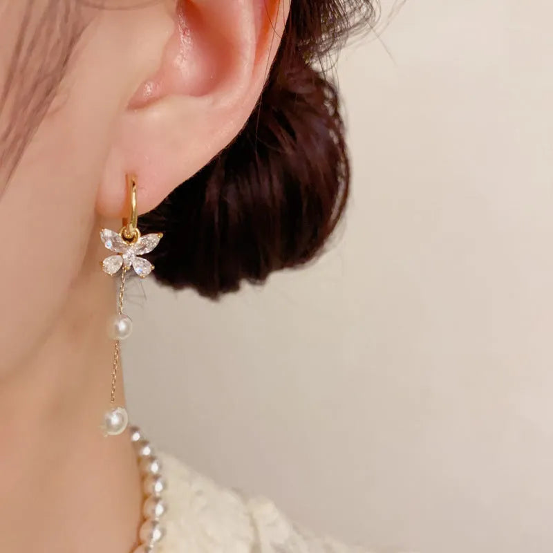One pair of gold plated copper ear clips with butterfly pearl tassel design, clip-on style for women