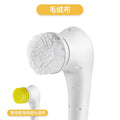 White cordless electric scrubber with five interchangeable brush heads on a kitchen counter