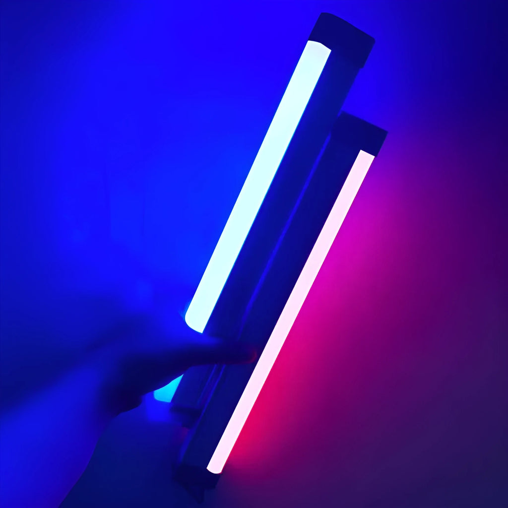Blue and purple rechargeable LED tube light sticks in 17cm and 32cm sizes on a dark surface.