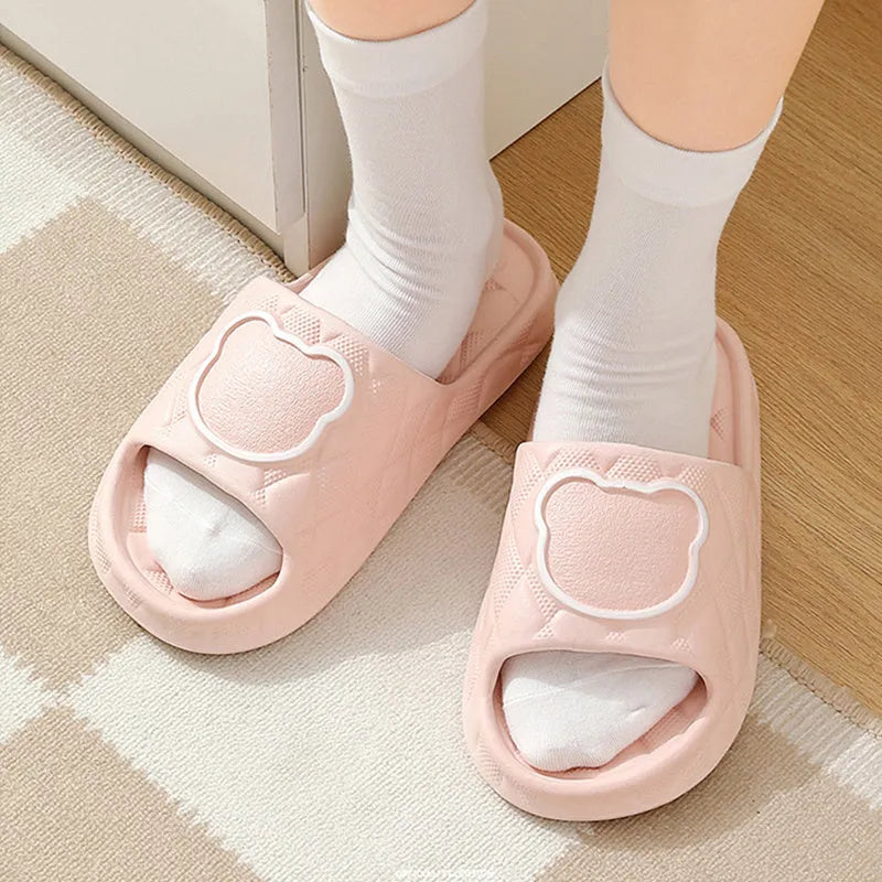 Rhombus design bear slippers in EVA with non-slip thick sole, shown in black, green, grey, khaki, pink, white, and yellow.