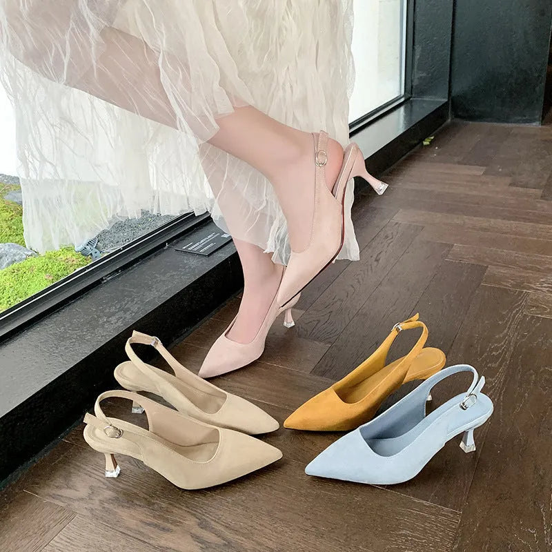 Women's apricot suede pointed-toe stiletto high heels on a light background.
